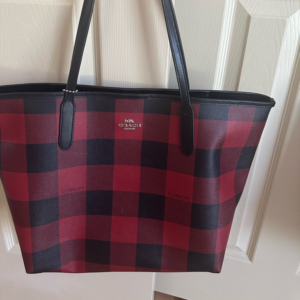 Red and black printed Coach Tote gently used condition.